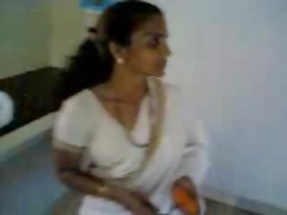 Indian wife in kitchen